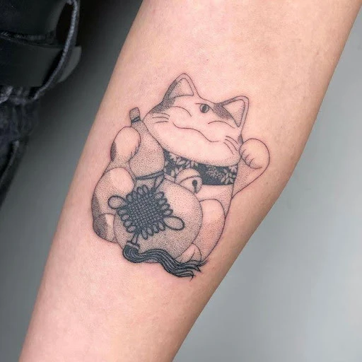 cat in dreams tattoo